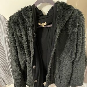 Black warm jacket. Faux fur.